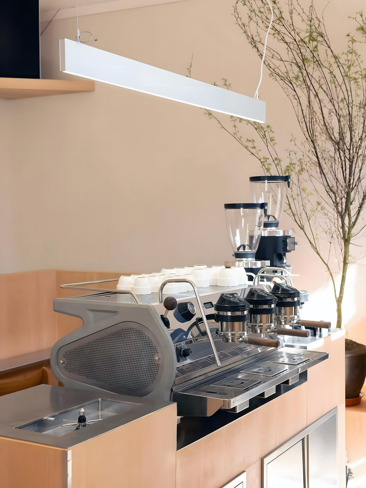 Studio interior with culinary workstation and soft monochrome panels